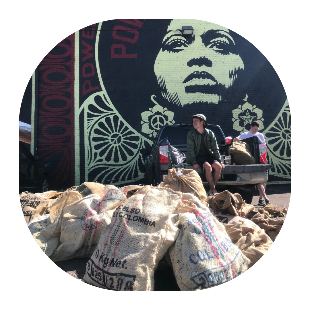 Habitual Roots Denver leading a community trash clean-up